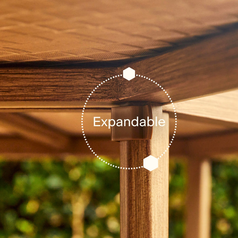 Close-up shot of the underside of the table, where the legs and tabletop meet. Over the image is the word “expandable.”|ap